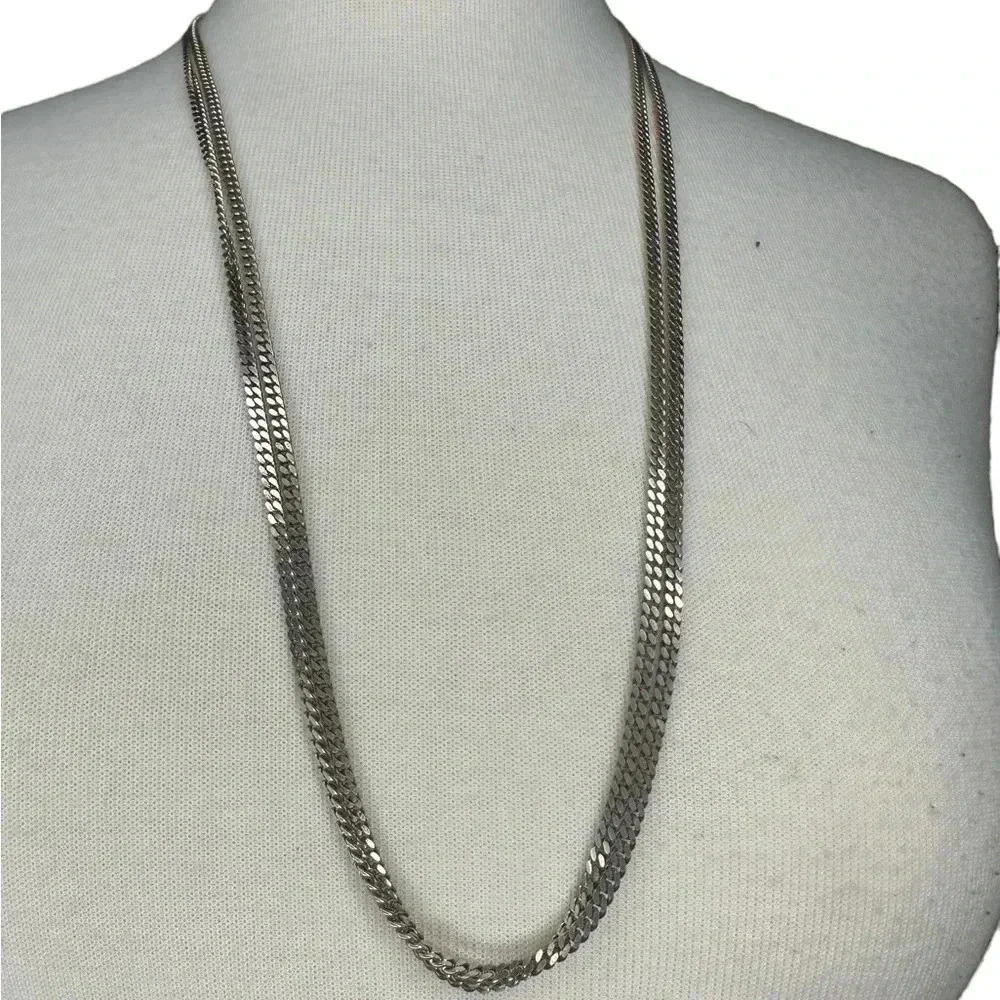 Silver Pendant Necklace with Intricate Detailing